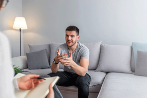 a young man opens up in his therapy program for benzo addiction rehab 